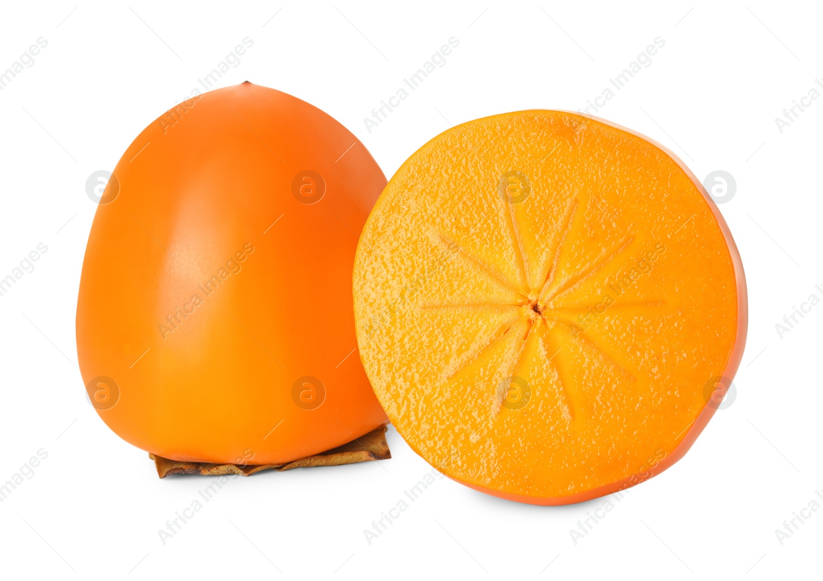 Photo of Whole and cut delicious ripe juicy persimmons on white background