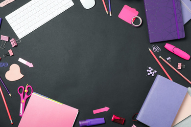 Photo of Flat lay composition with keyboard and stationery on black background, space for text. Designer's workplace