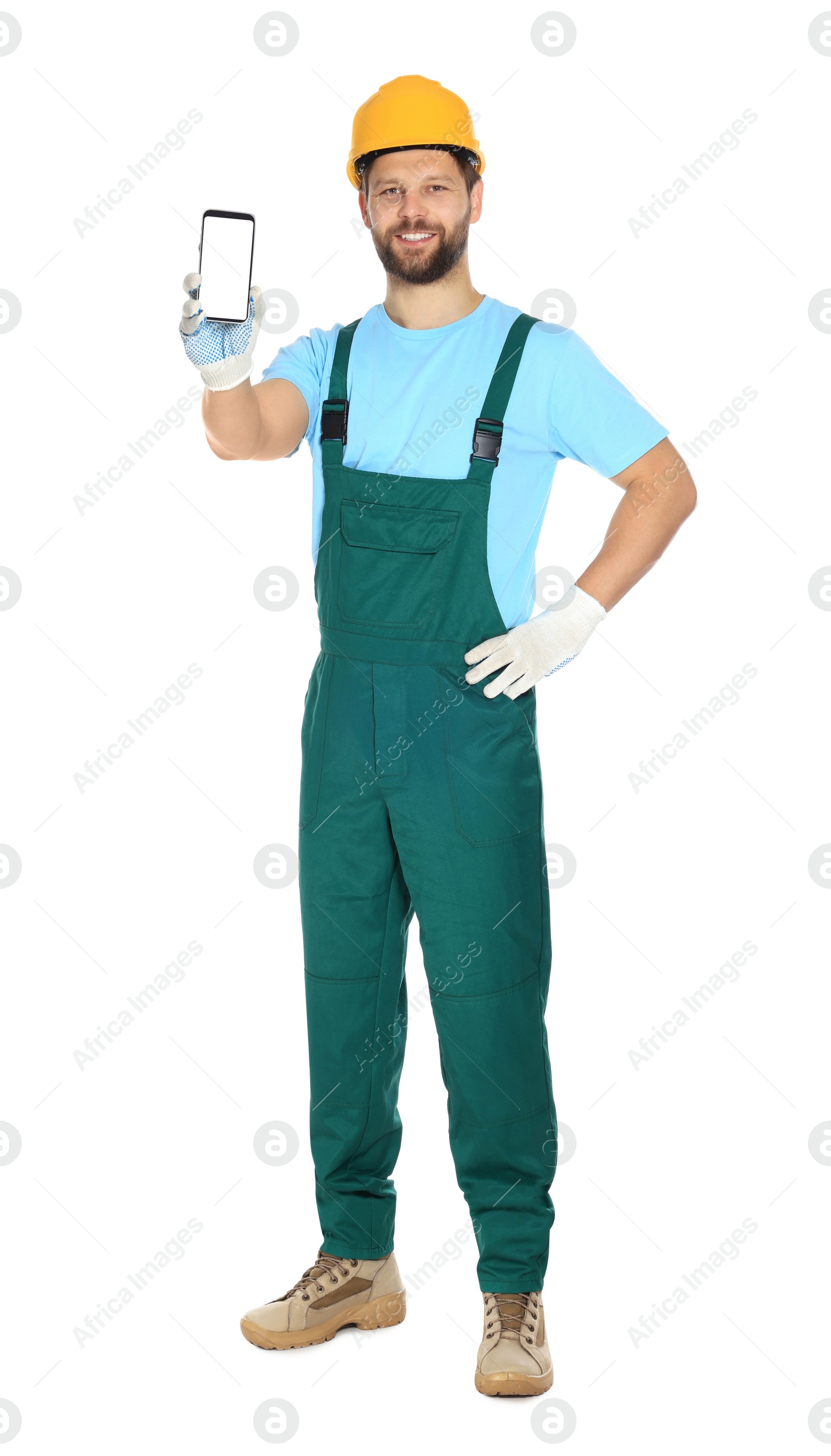 Photo of Professional repairman in uniform showing smartphone on white background