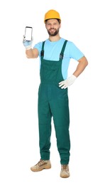 Photo of Professional repairman in uniform showing smartphone on white background