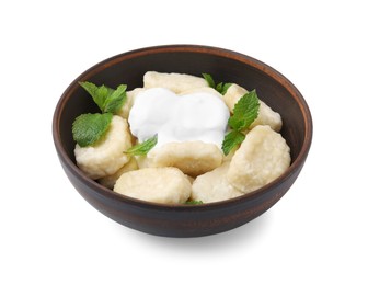 Bowl of tasty lazy dumplings with mint leaves and sour cream isolated on white