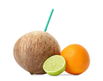 Photo of Brown coconut with lime and orange on white background