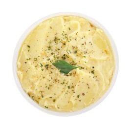 Photo of Bowl of delicious mashed potato with parsley isolated on white, top view
