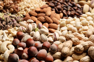 Organic mixed nuts as background, closeup. Healthy snack