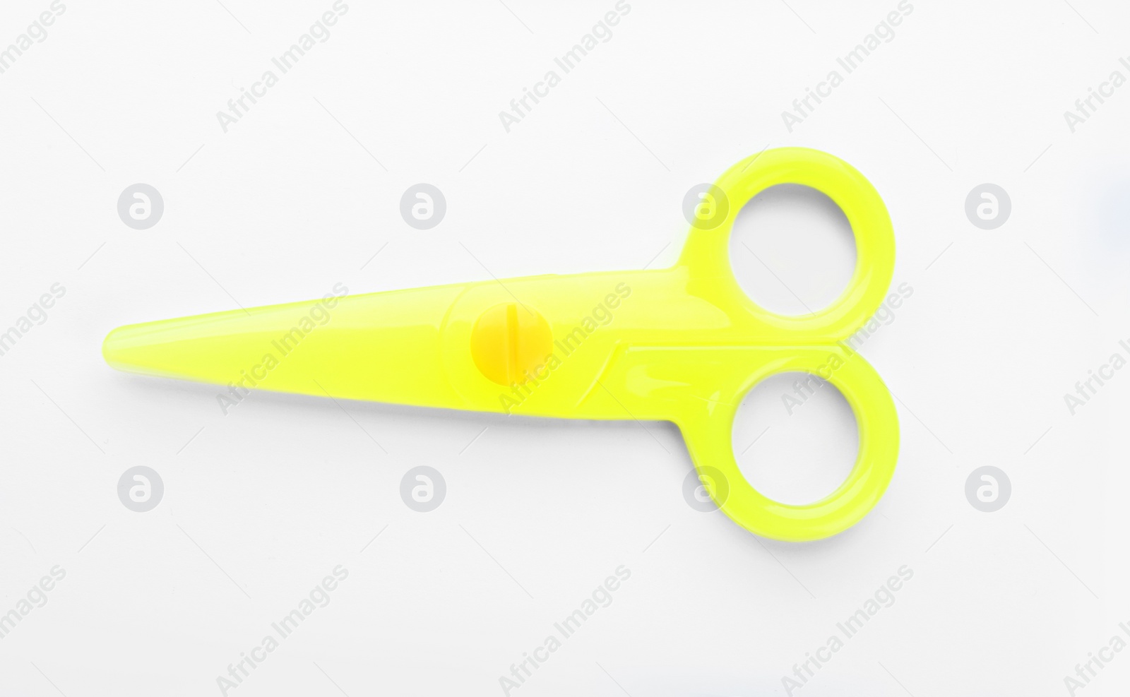 Photo of Colorful plastic scissors on white background. School stationery