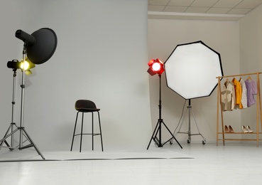 Interior of modern photo studio with professional equipment