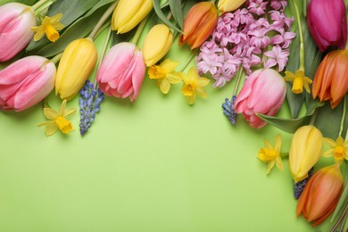 Photo of Beautiful different flowers on green background, flat lay. Space for text