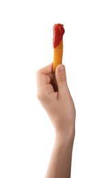 Photo of Woman holding delicious cheese stick with ketchup on white background, closeup