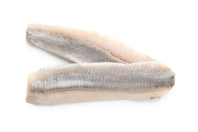 Delicious salted herring fillets on white background, top view