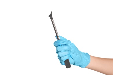 Photo of Doctor in sterile glove holding medical tool on white background