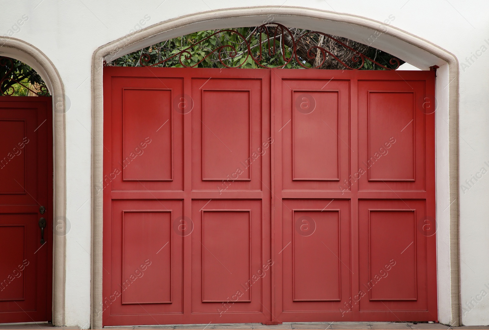 Photo of Exterior of building with beautiful wooden gates