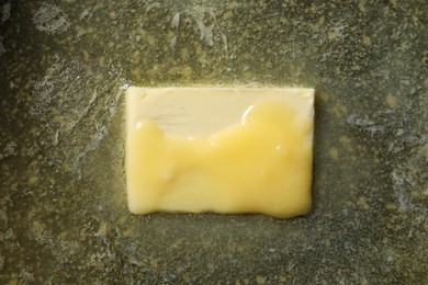 Tasty melting butter, top view. Dairy product