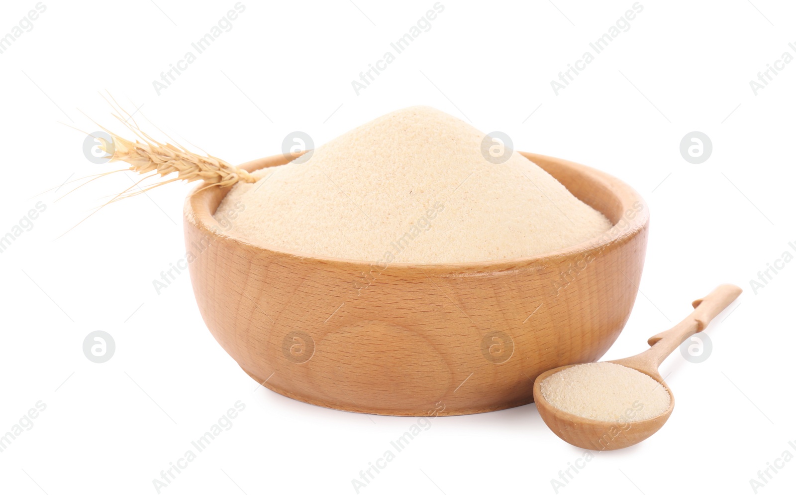 Photo of Semolina in wooden bowl and spoon on white background