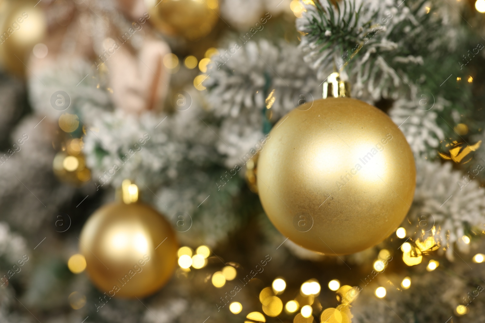 Photo of Beautiful decorated Christmas tree with baubles and lights as background, closeup