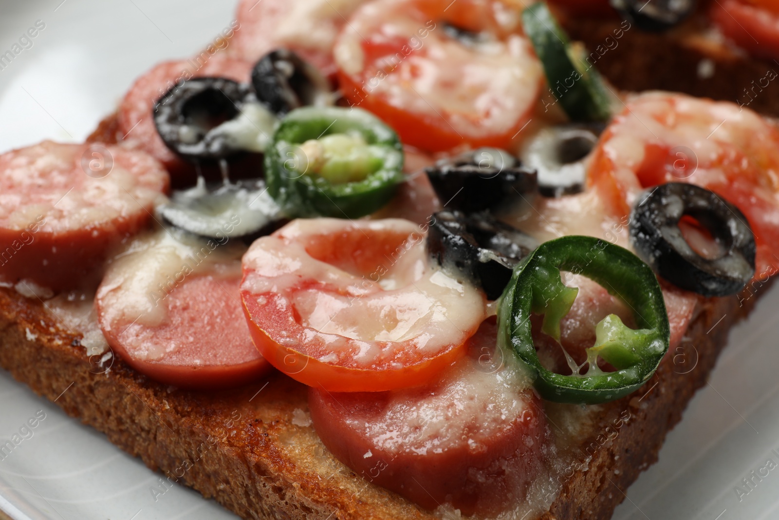 Photo of Tasty pizza toast on plate, closeup view