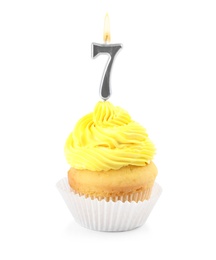 Photo of Birthday cupcake with number seven candle on white background