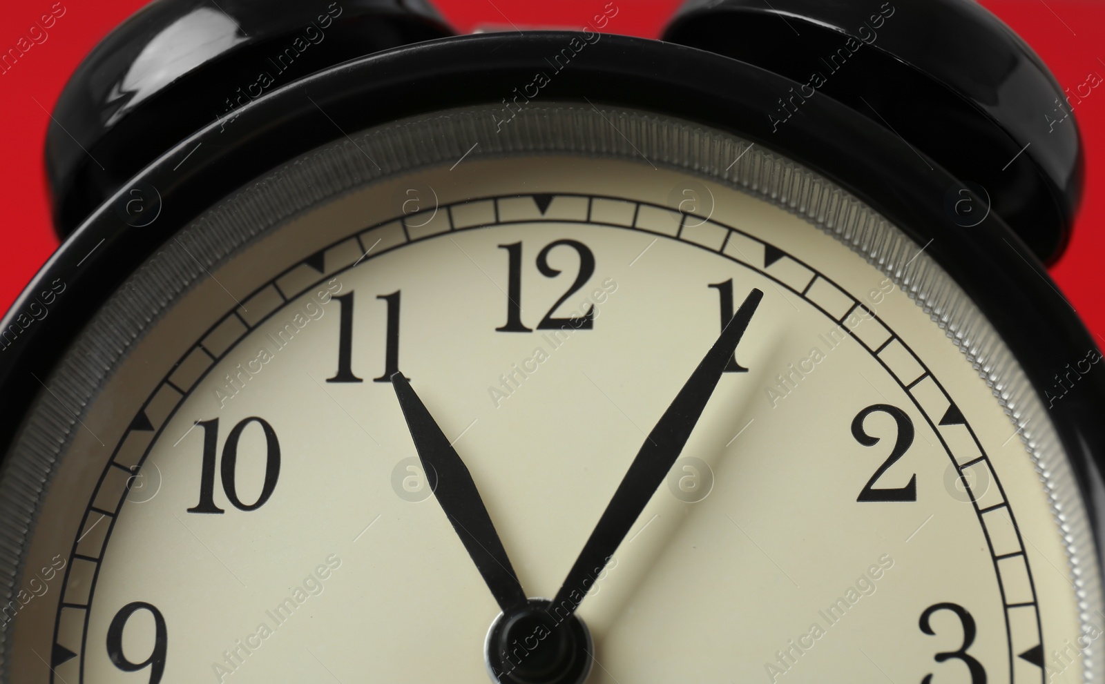 Photo of Alarm clock, closeup. Time change concept