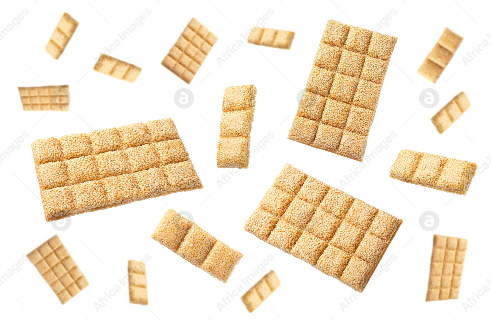 Image of Tasty sweet kozinaki flying on white background