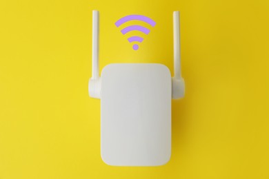 Image of New modern repeater and Wi-Fi symbol on yellow background