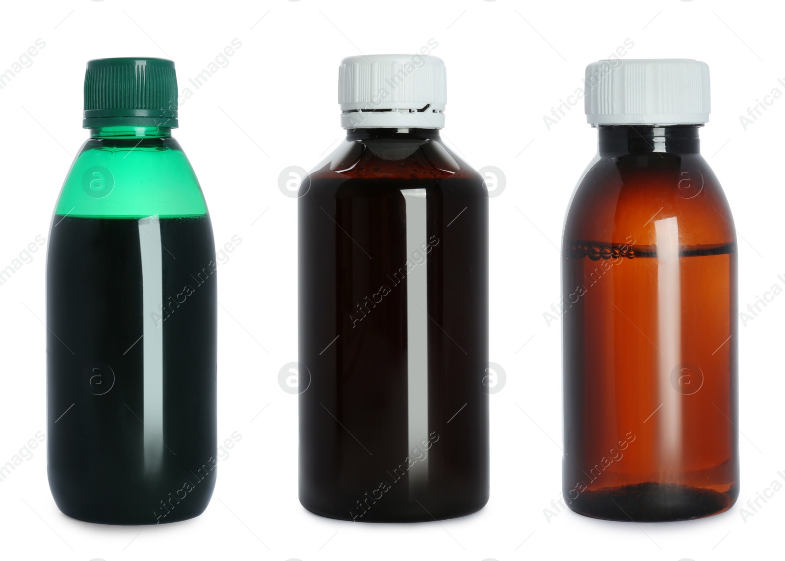 Image of Set with cough syrup on white background