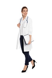 Full length portrait of medical doctor with clipboard and stethoscope isolated on white