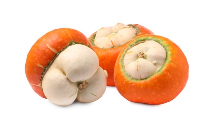 Photo of Three fresh ripe pumpkins isolated on white