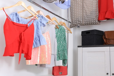 Photo of Modern dressing room with different stylish clothes and accessories