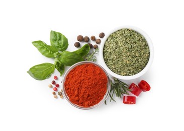 Photo of Different natural spices and herbs on white background, top view