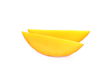 Photo of Slices of ripe mango isolated on white. Exotic fruit