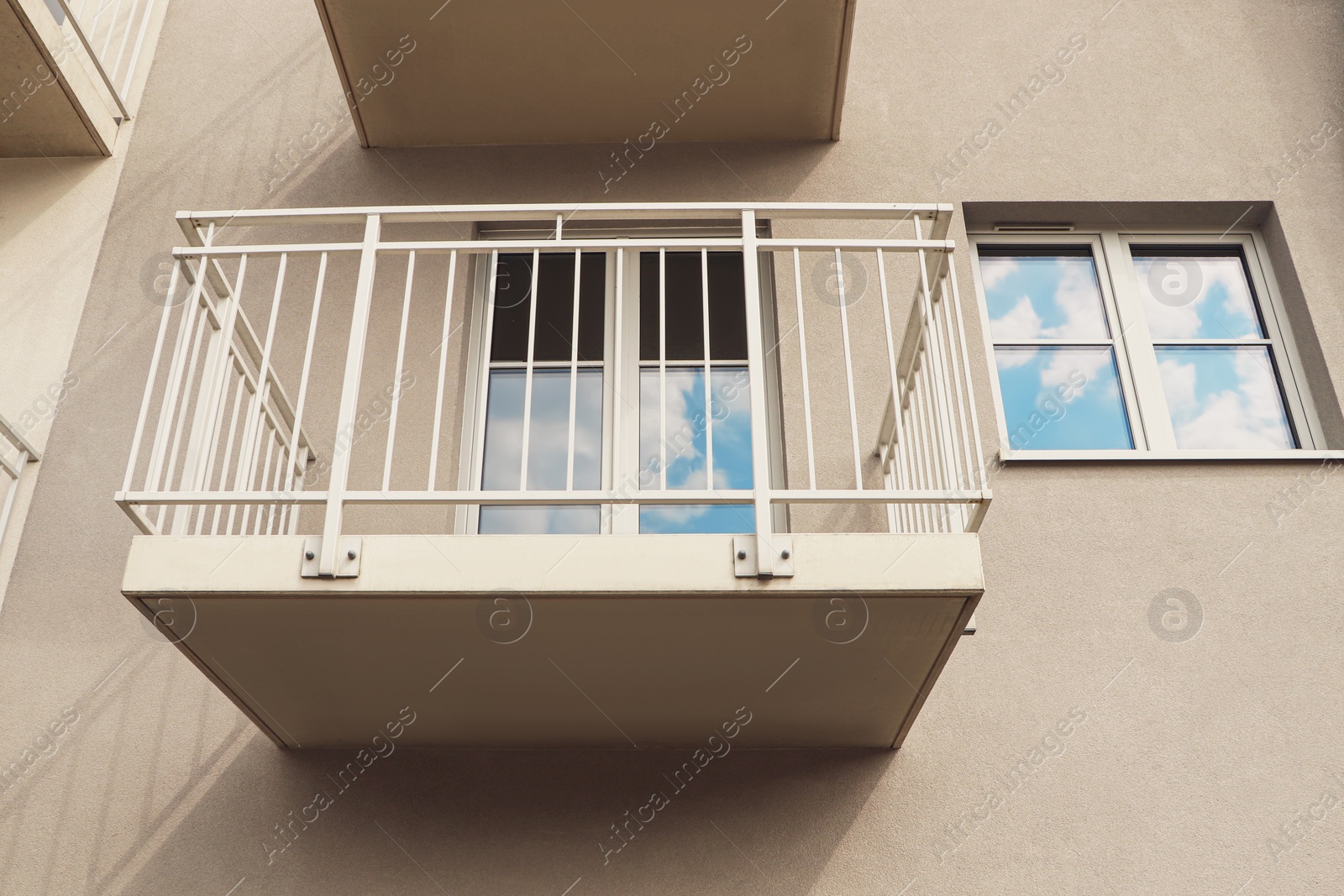 Photo of Exterior of beautiful building with empty balcony