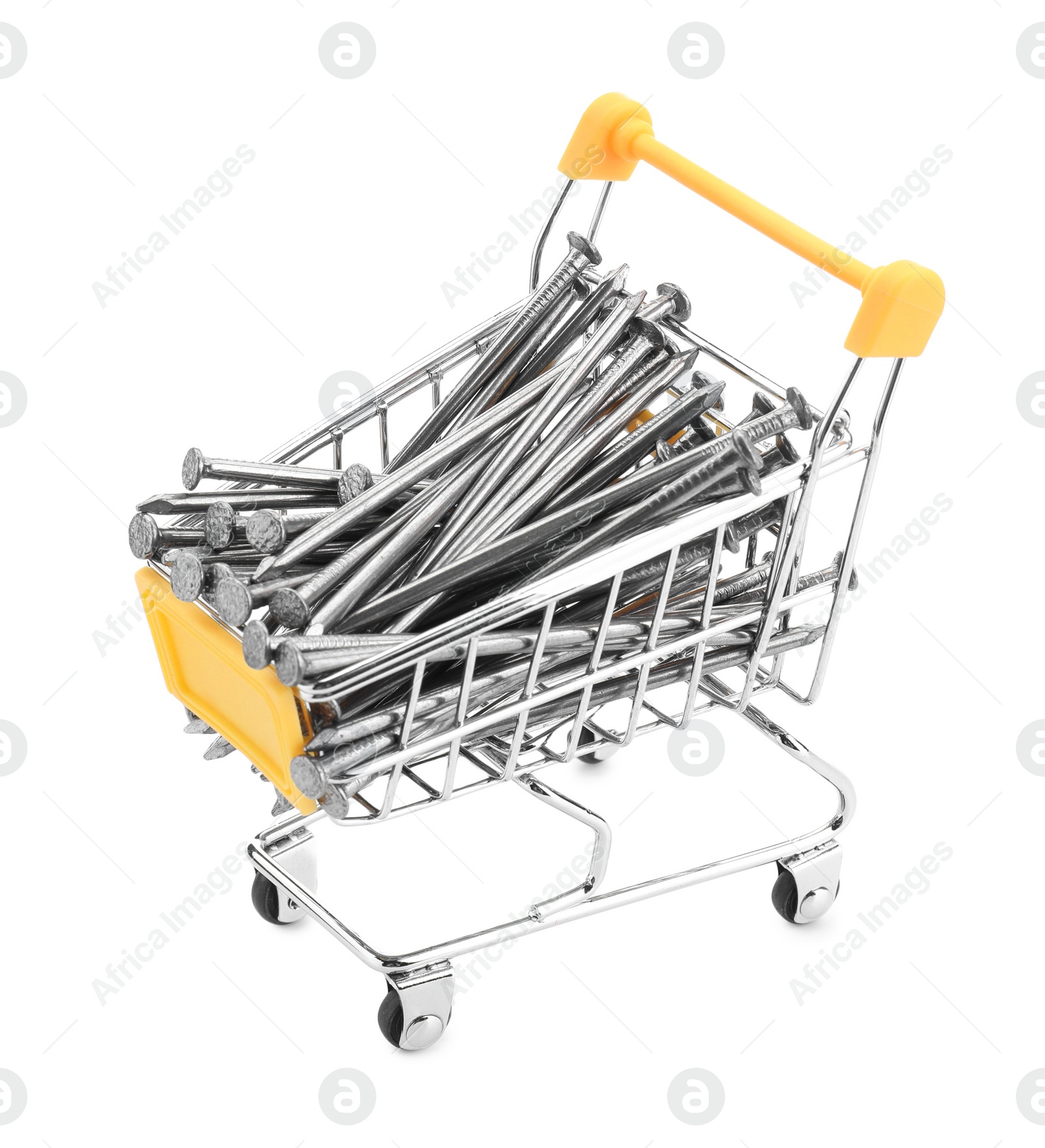 Photo of Metal nails in shopping cart isolated on white