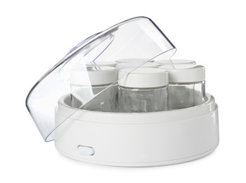 Modern yogurt maker with empty jars on white background