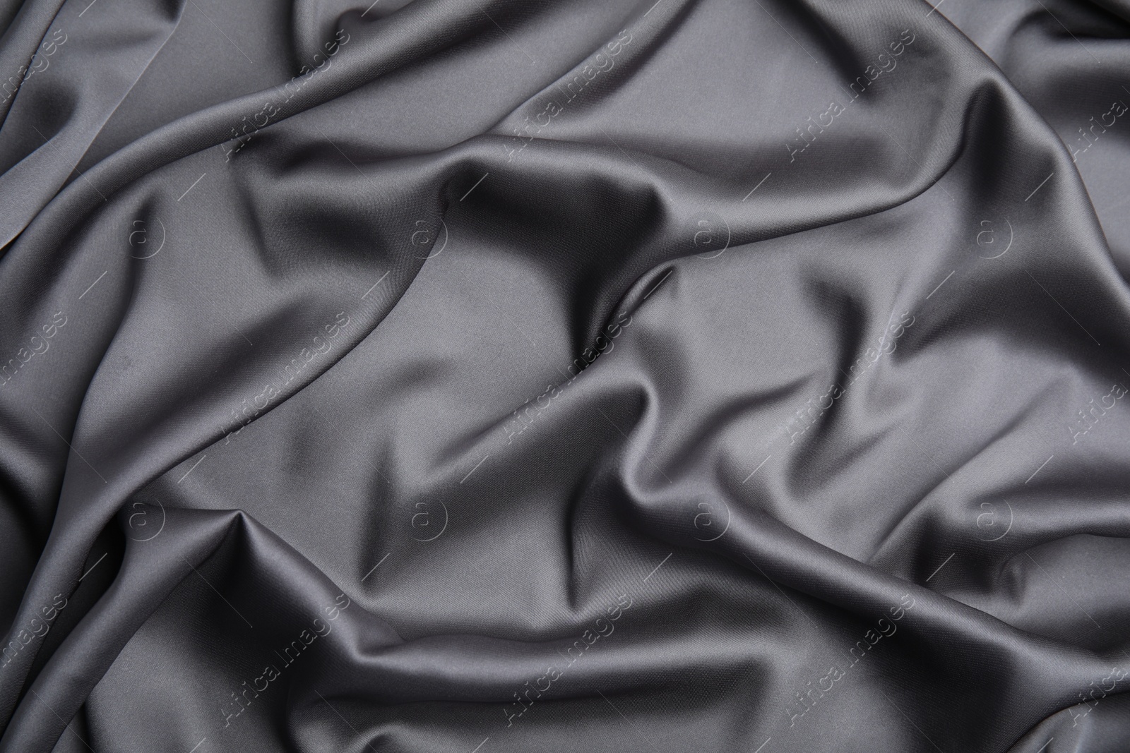 Photo of Texture of delicate black silk as background, top view