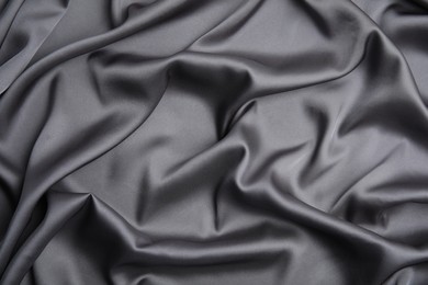 Texture of delicate black silk as background, top view