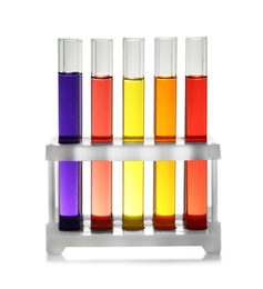 Photo of Rack with test tubes of color liquid isolated on white. Solution chemistry