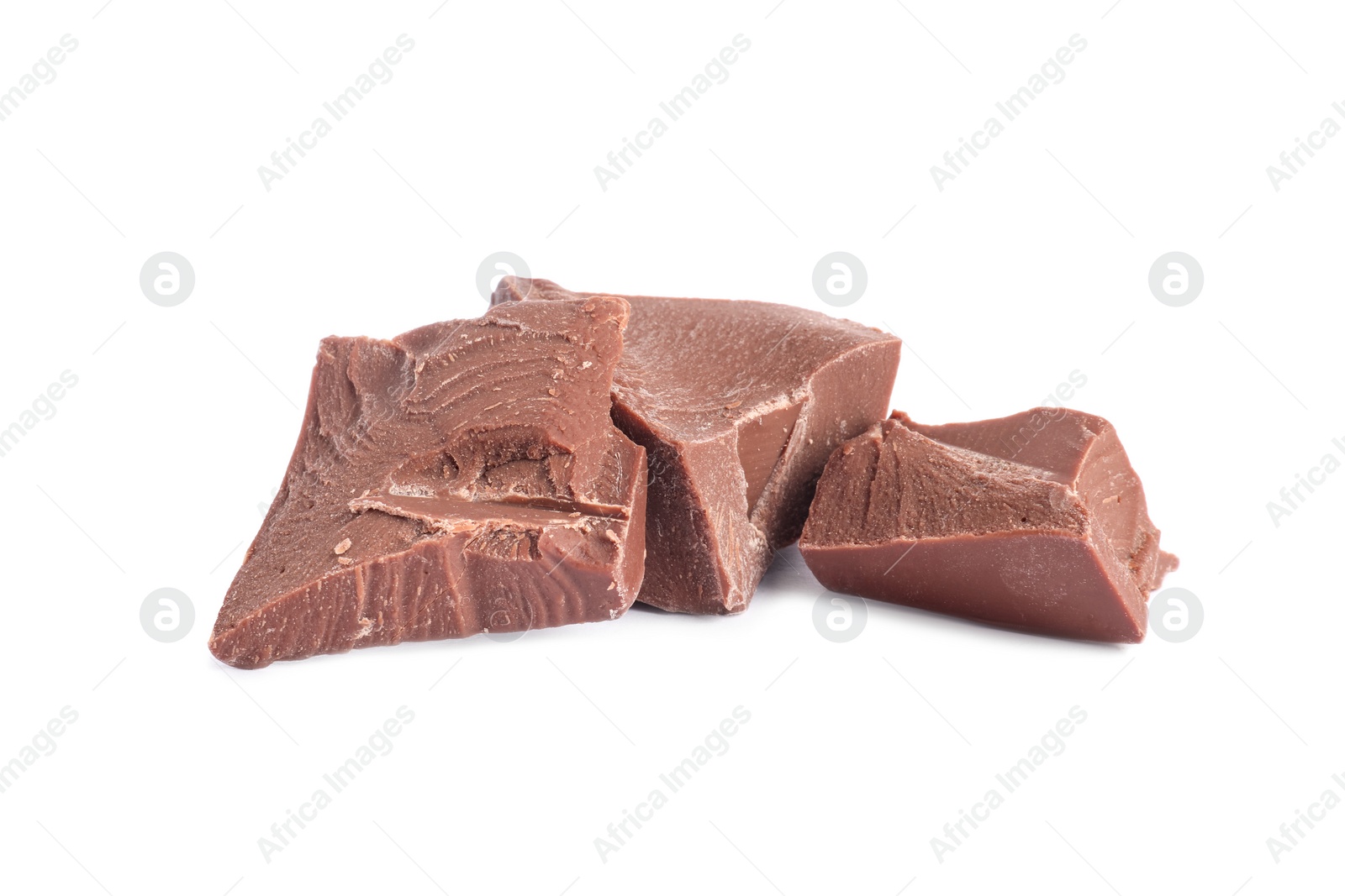 Photo of Pieces of tasty milk chocolate isolated on white