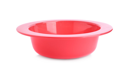 Photo of Red plastic bowl isolated on white. Serving baby food