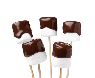 Photo of Tasty marshmallows dipped into chocolate on white background