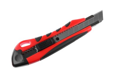 Photo of Red utility knife isolated on white. Construction tool