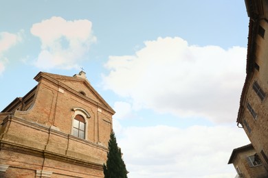 Photo of Exterior of beautiful church against blue sky, low angle view