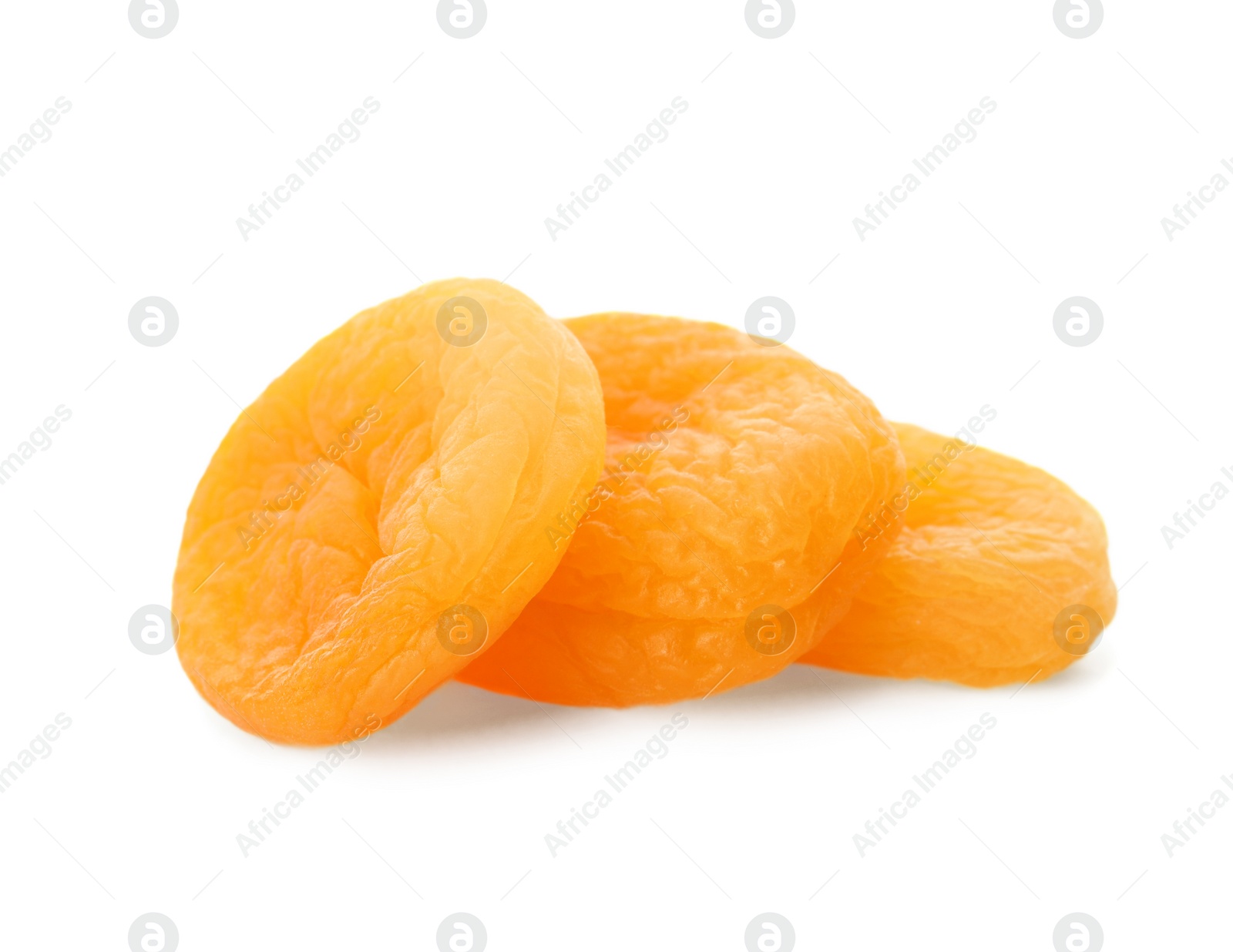 Photo of Tasty apricots on white background. Dried fruits