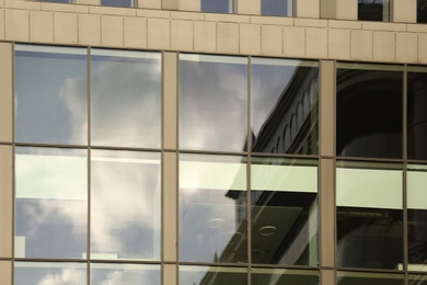 Modern office building with tinted windows. Urban architecture