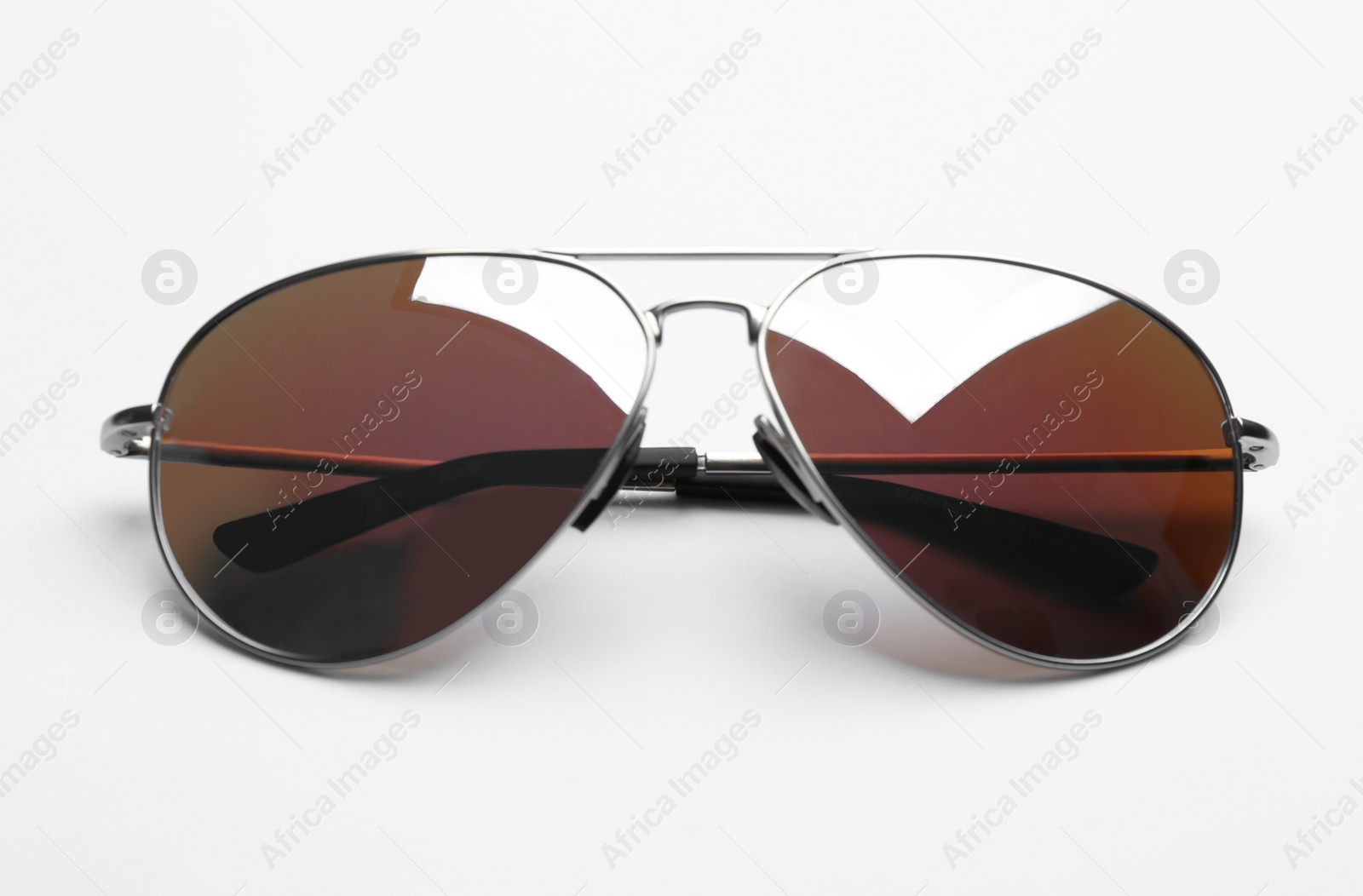 Photo of Stylish sunglasses on white background. Fashionable accessory