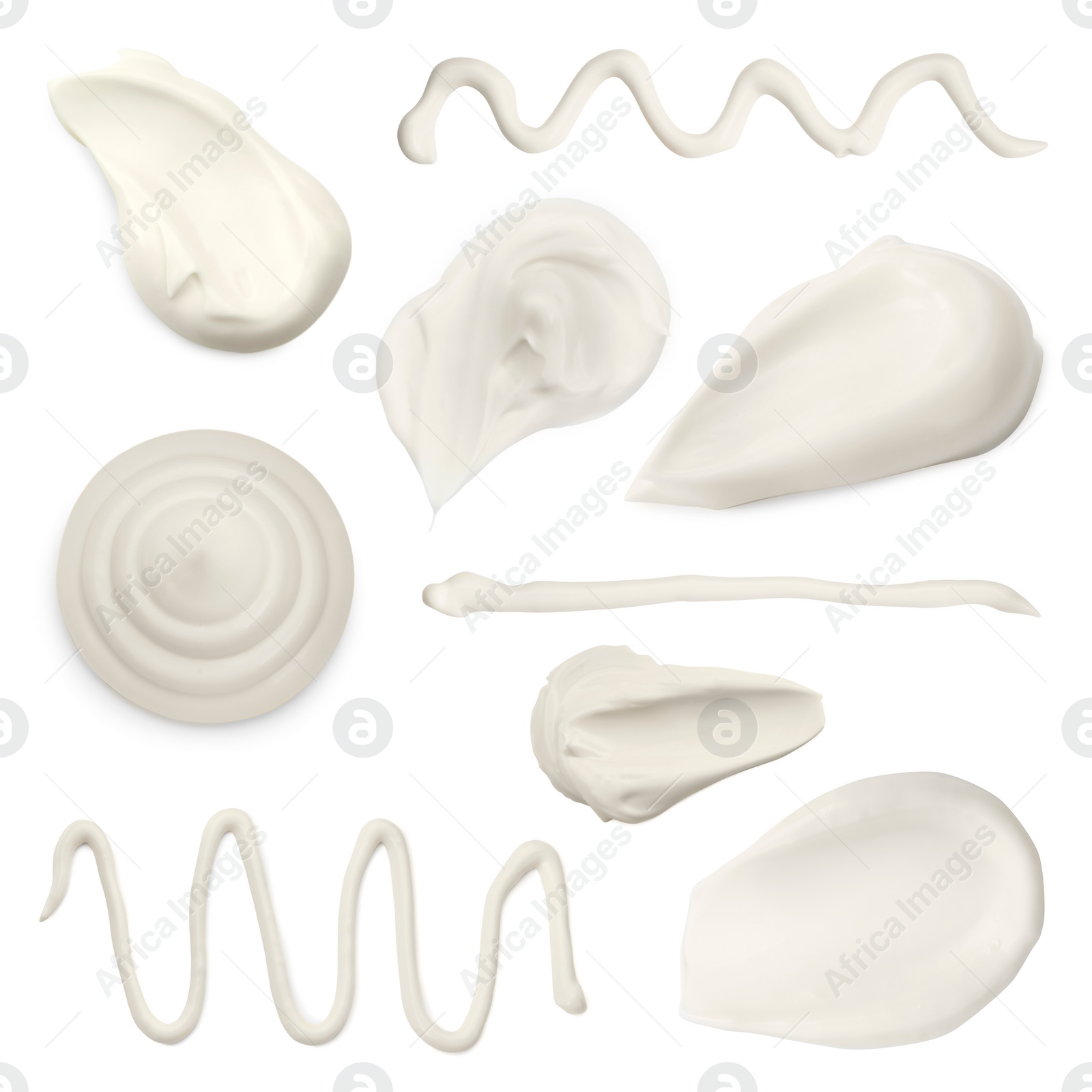 Image of Sour cream or mayonnaise smears isolated on white, set. Delicious sauce