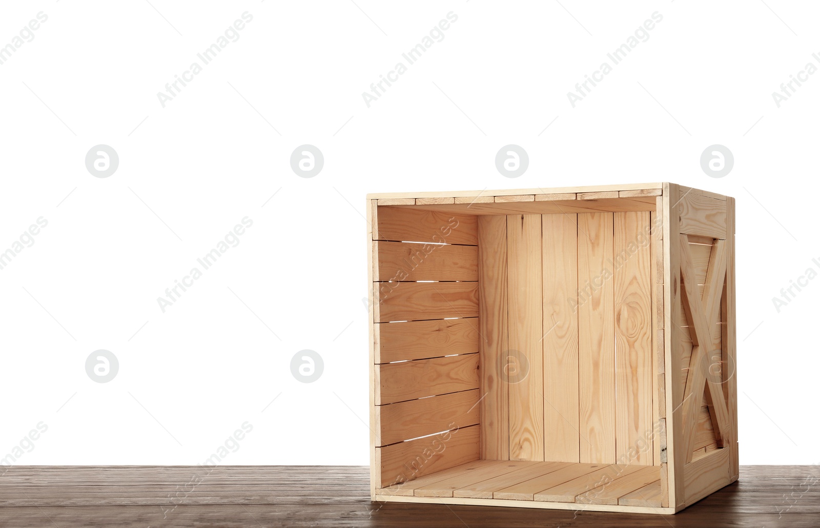 Photo of Wooden crate on table against white background. Space for text