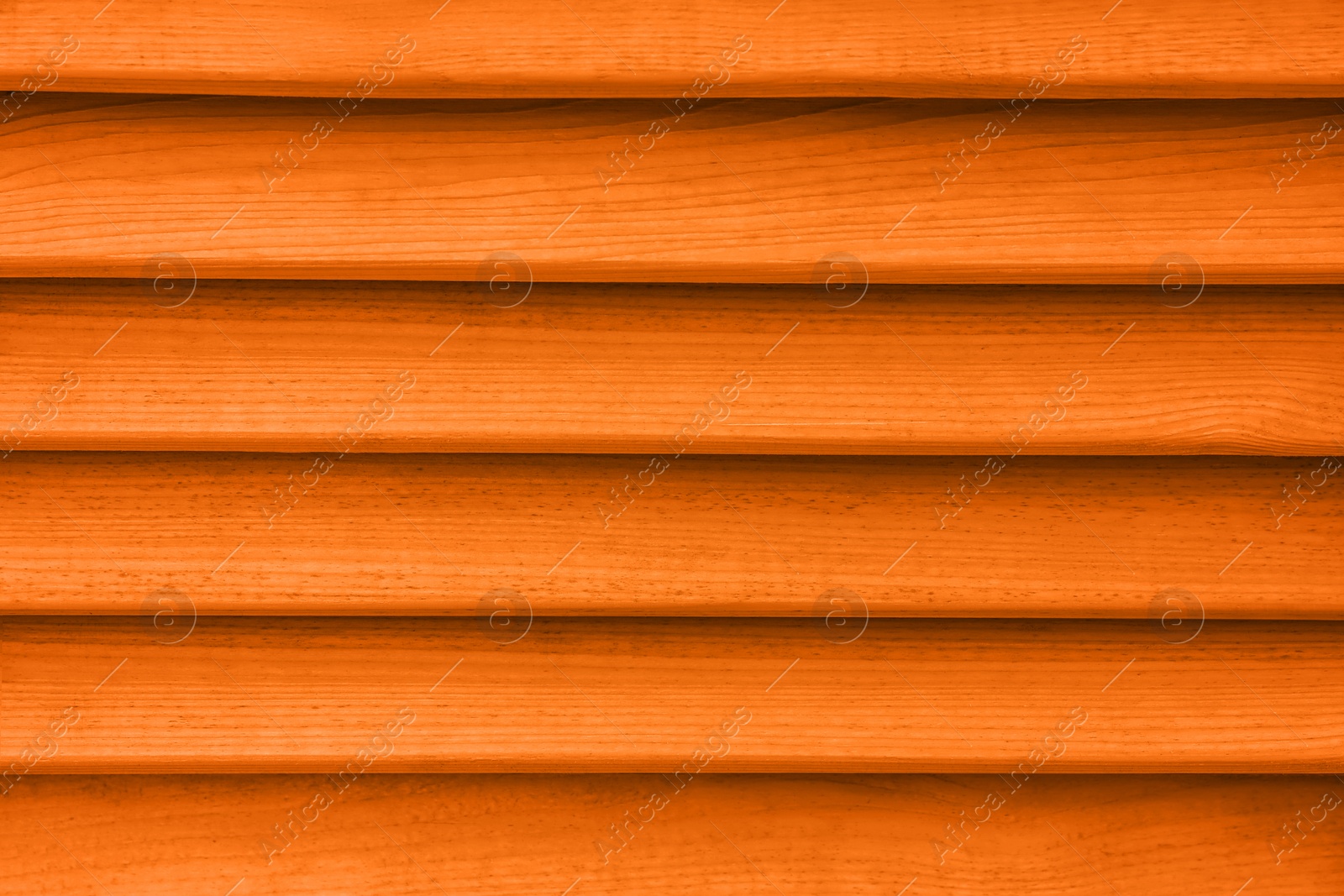 Image of Texture of orange wooden planks as background, closeup