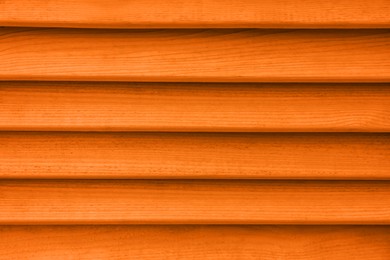 Image of Texture of orange wooden planks as background, closeup