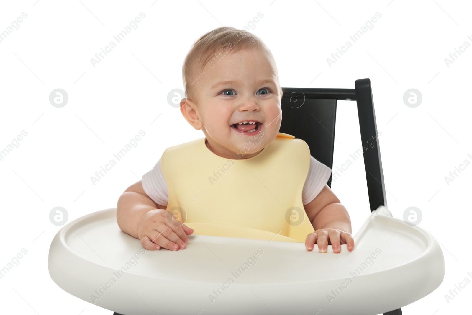 Photo of Cute little baby wearing bib in highchair on white background