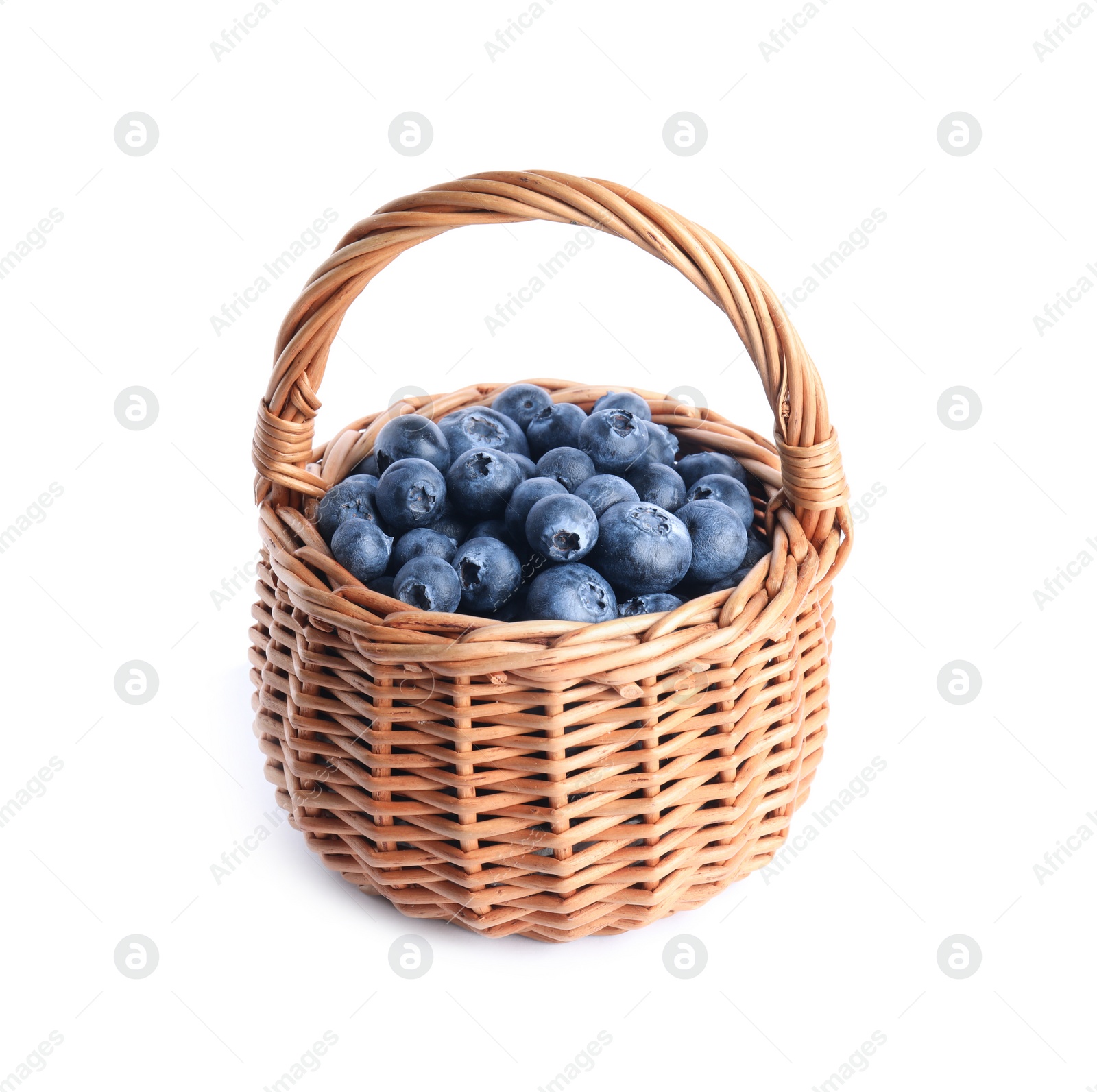 Photo of Fresh tasty blueberries in wicker basket isolated on white