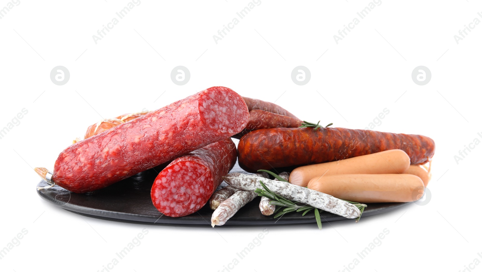 Photo of Slate plate with different tasty sausages isolated on white